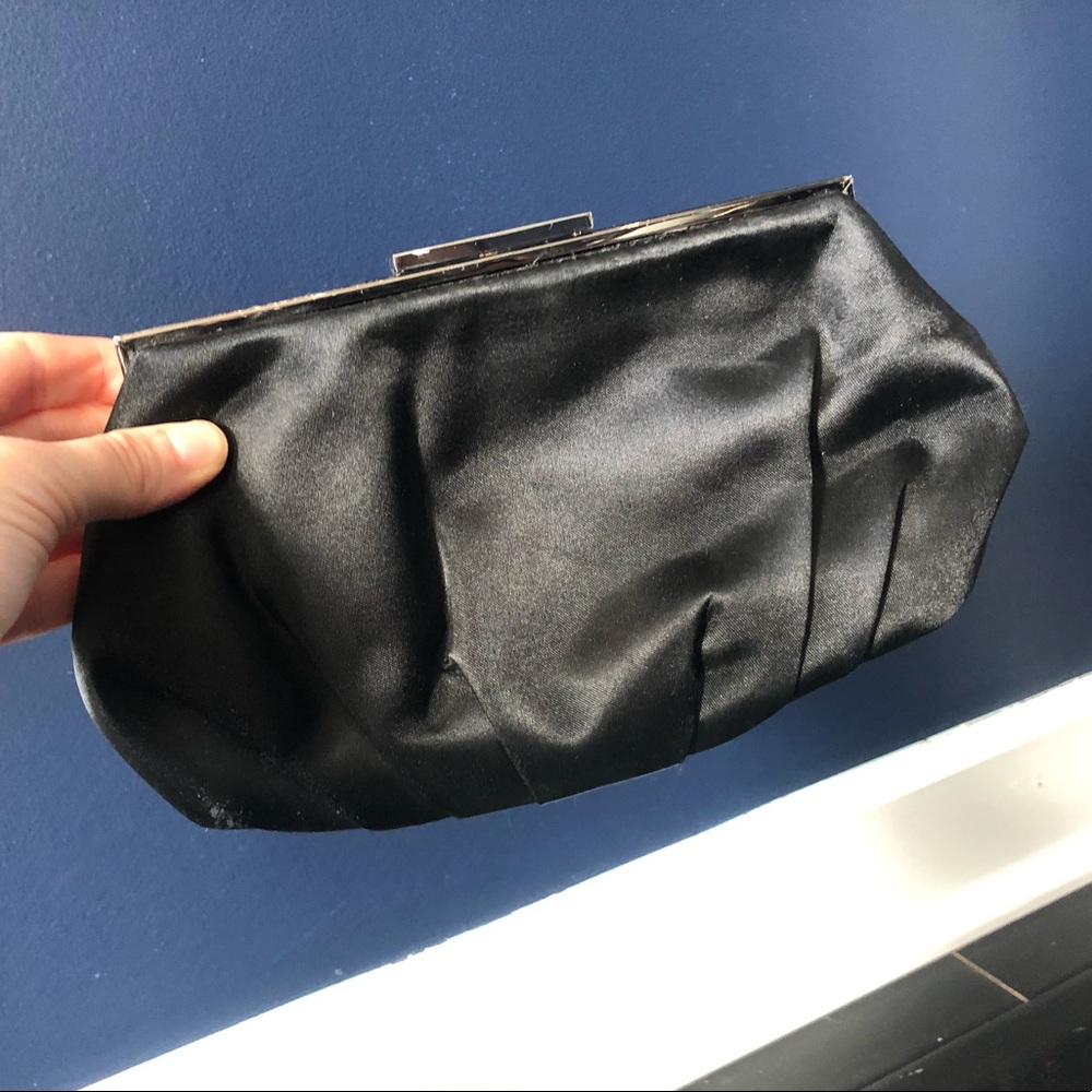 Satin clutch with long strap.